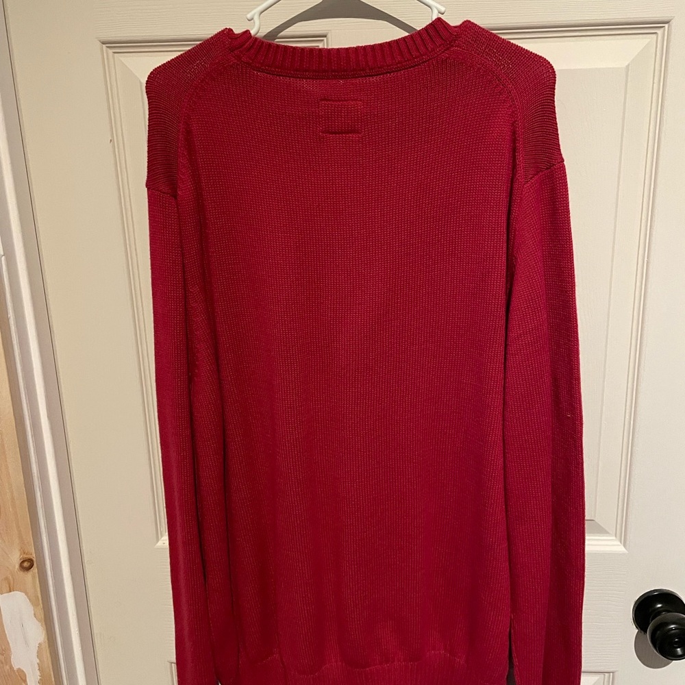 Red sweater brand new.
